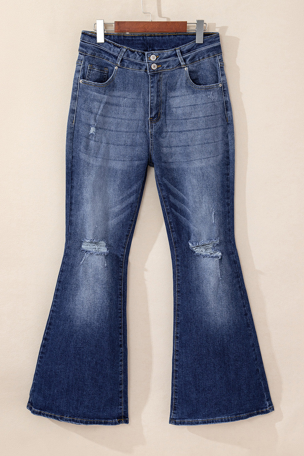 Hemelsblauwe flare-jeans met hoge taille, gescheurde knoopsluiting