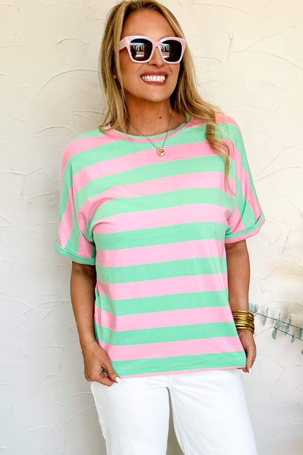 Roze gestreept los T-shirt met colorblock mouwen en manchetten