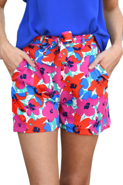 Shorts met riem en roze bloemenprint