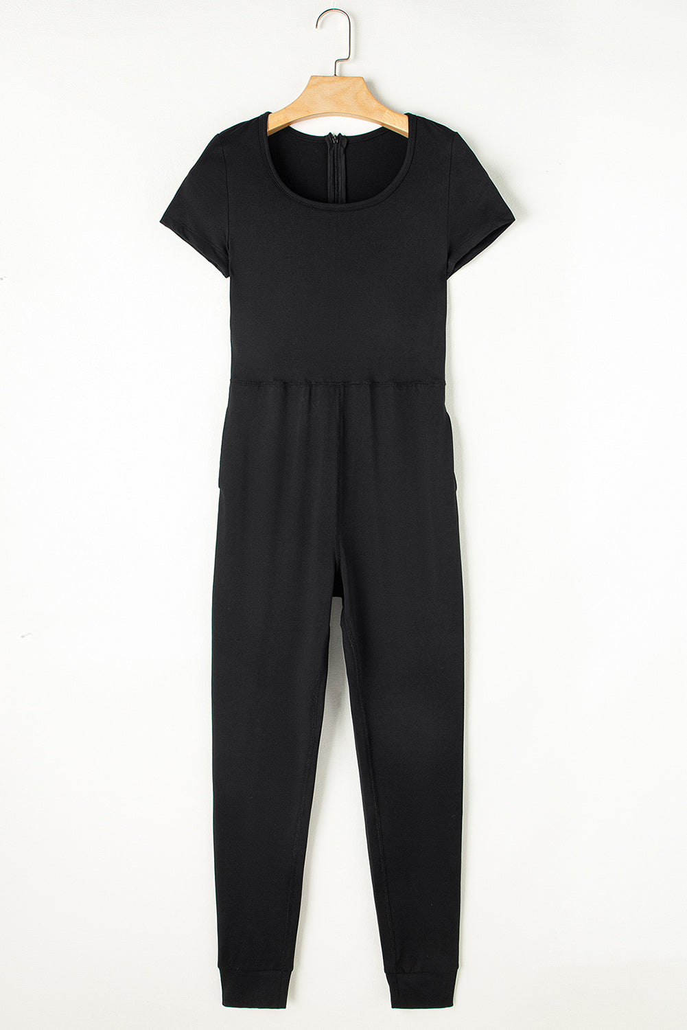 Zwarte Athleisure jumpsuit met korte mouwen en pocketjogger aan de onderkant