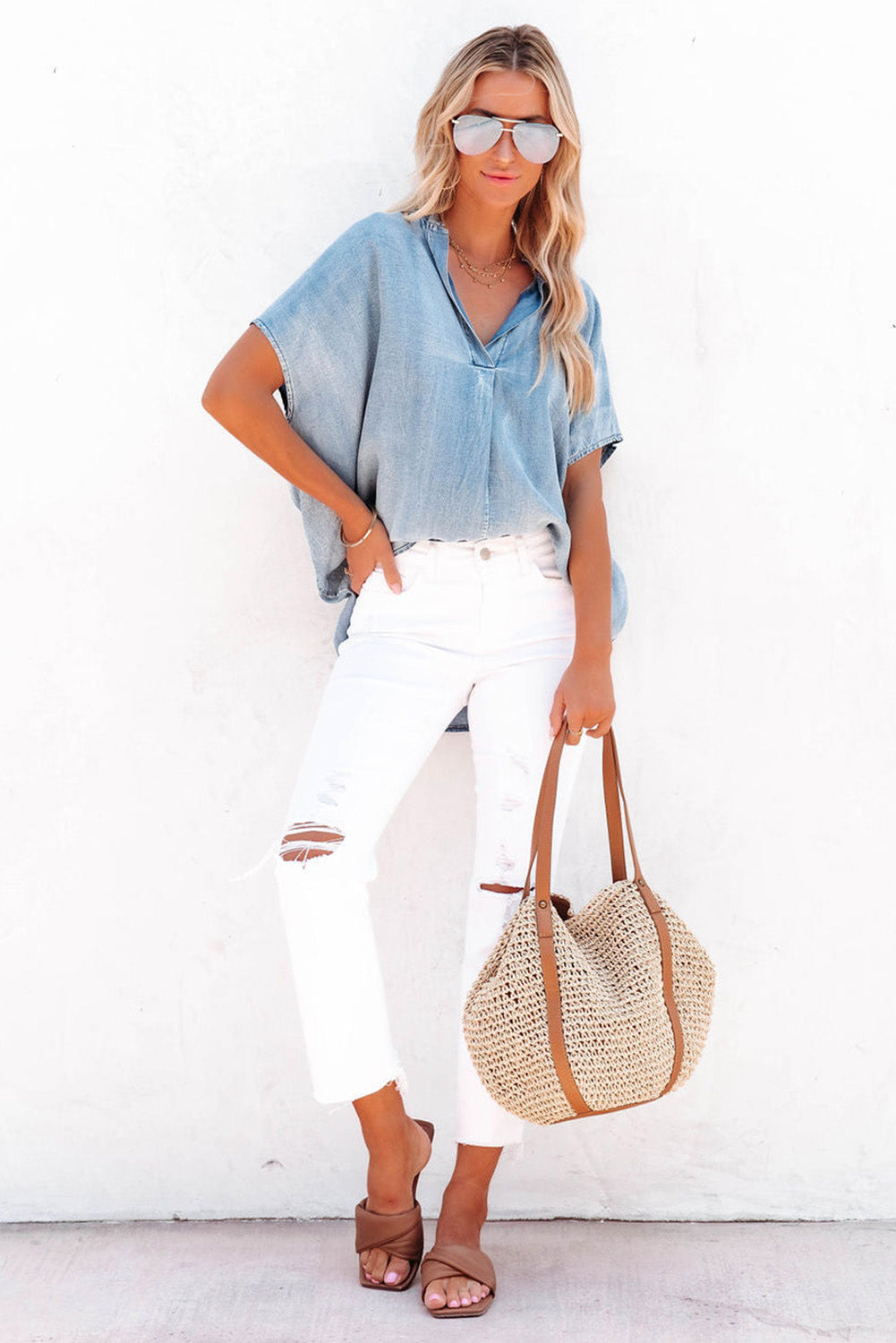 Hemelsblauwe oversized denim blouse met split en V-hals