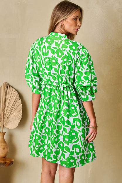 Groene bloemenprint Buff halve mouw v nek babydoll jurk