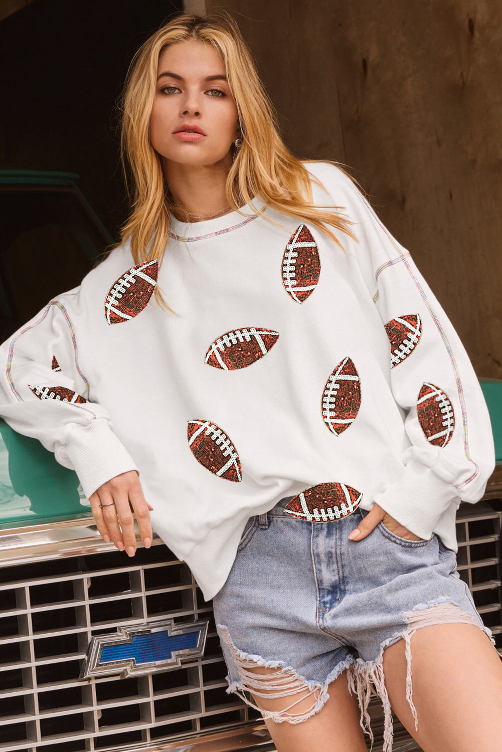 Wit pailletten rugby voetbalpatroon blootgesteld naad game day sweatshirt