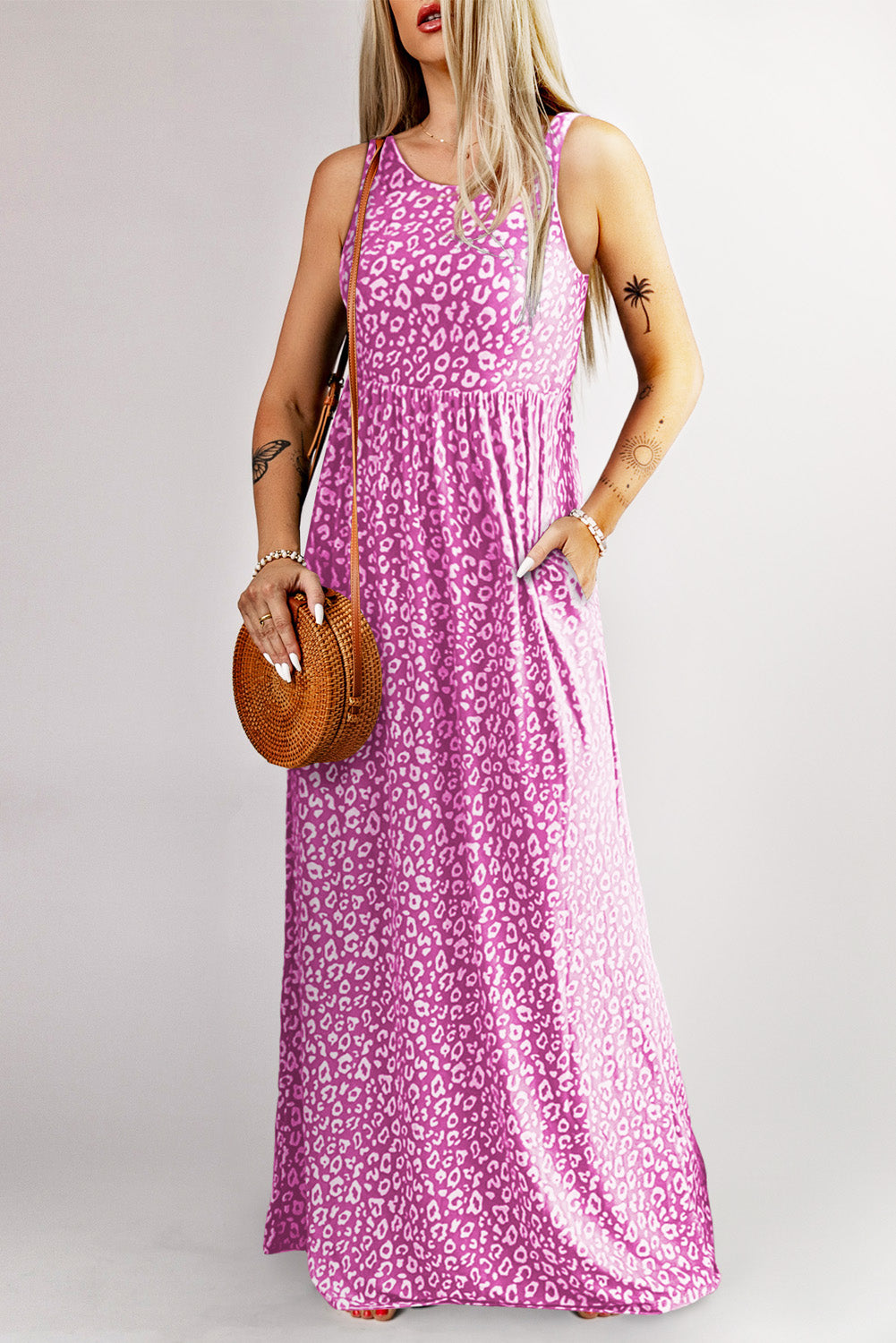 Mouwloze maxi-jurk met roze luipaardprint en zakken