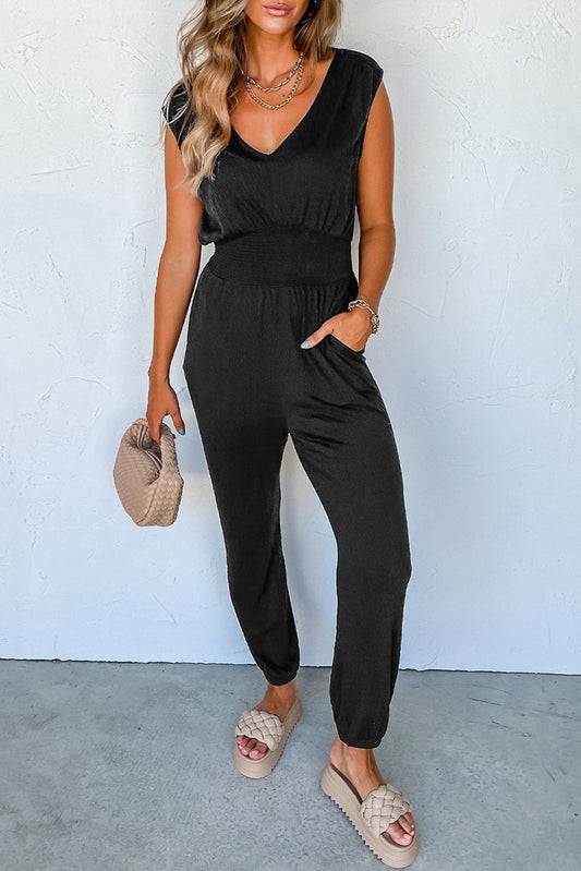 Zwarte gesmokte mouwloze jumpsuit met hoge taille en V-hals