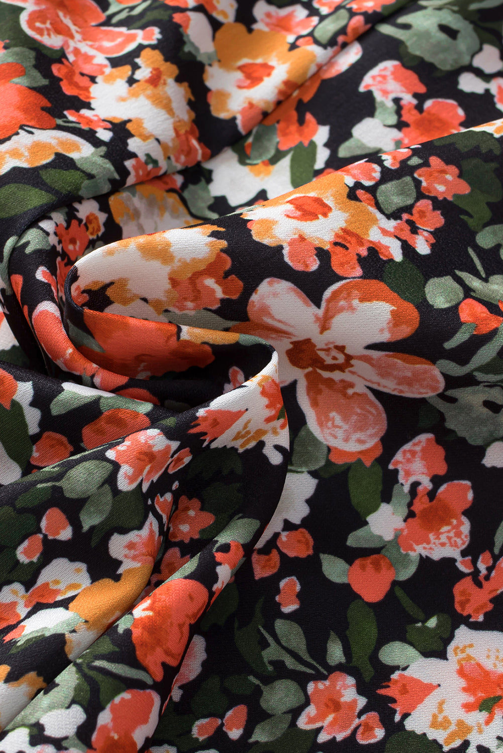 Oranje blouse met ruches, gesmokte manchetten en bloemen