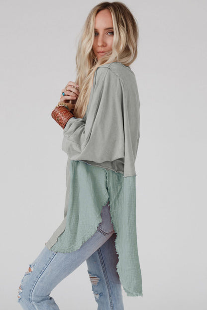 Grijze gekreukelde splitsen ruwe zoom hoge lage oversized blouse