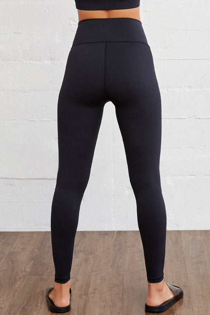 Zwarte gebogen taille naadloze actieve legging