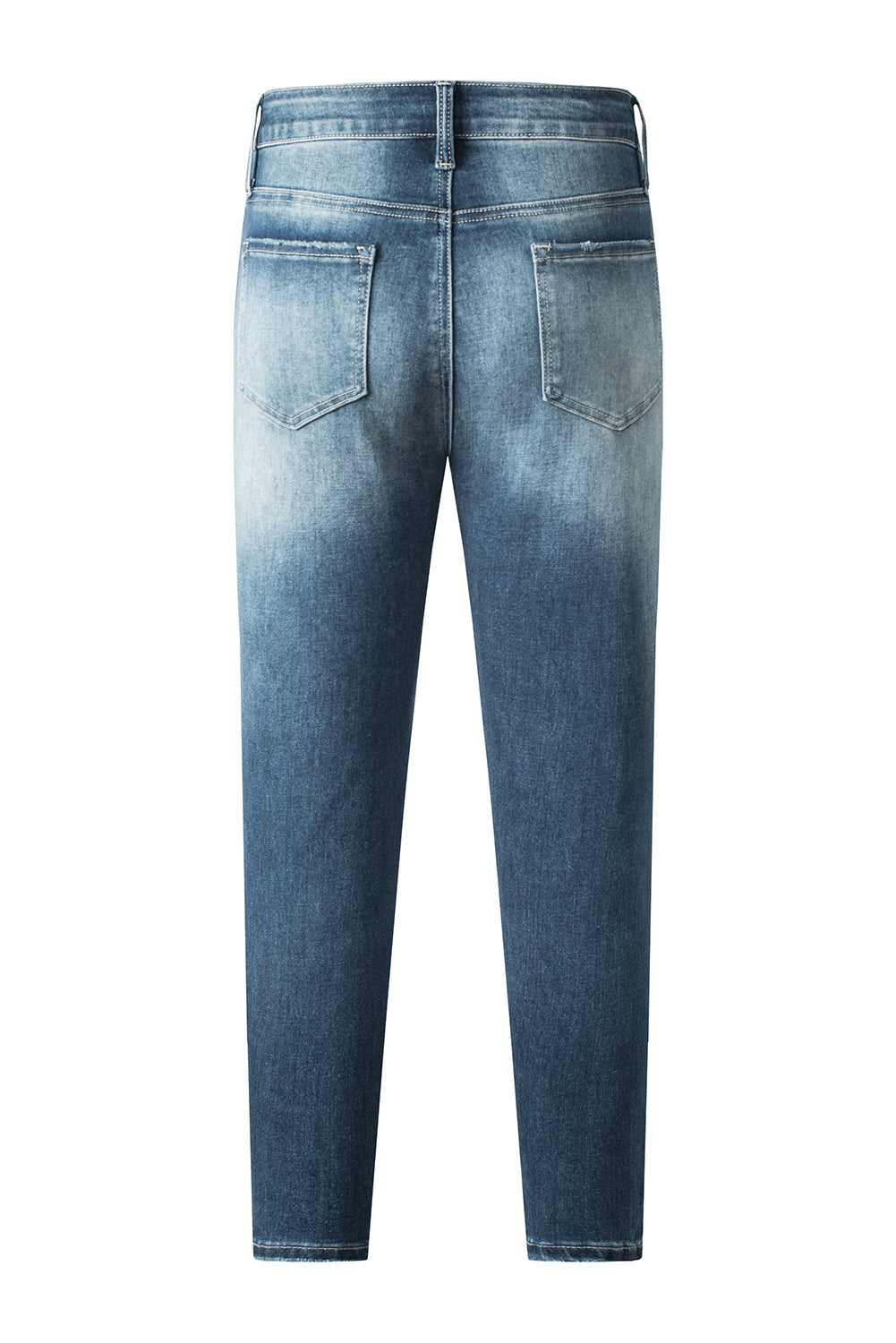 Blauwe noodlijdende gescheurde skinny jeans