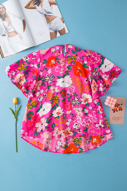 Roze gebloemde gesmokte blouse met korte mouwen