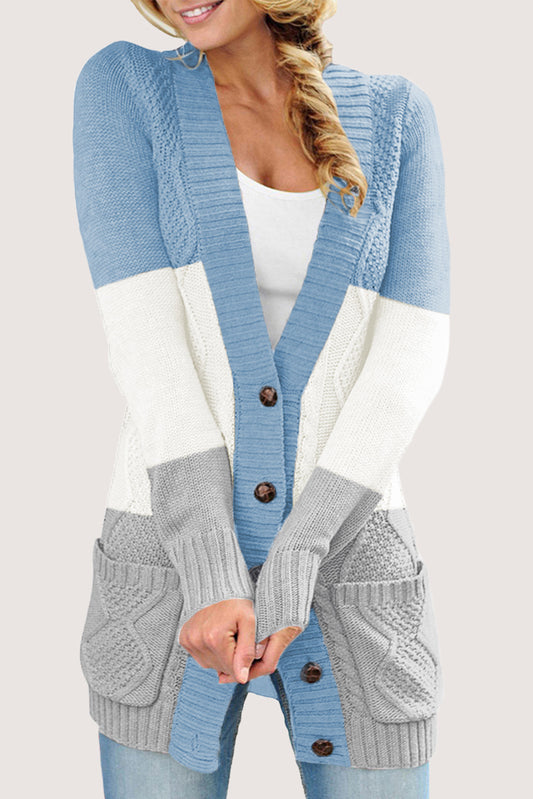 Blauw vest met voorzak en knoopsluiting