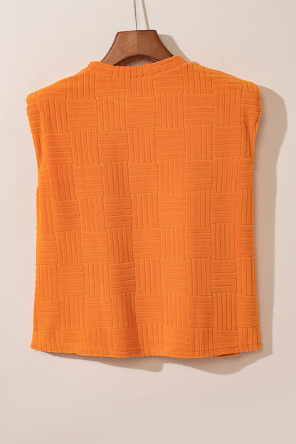 Oranje getextureerde tanktop en broek met wijde pijpen