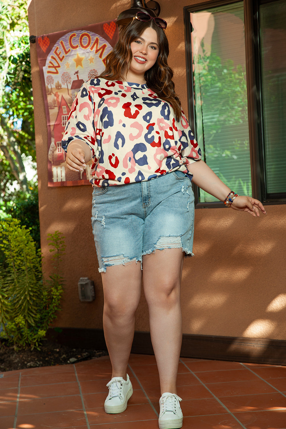 Witte kleurrijke blouse met vleermuismouwen en luipaardprint