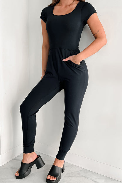 Zwarte Athleisure jumpsuit met korte mouwen en pocketjogger aan de onderkant