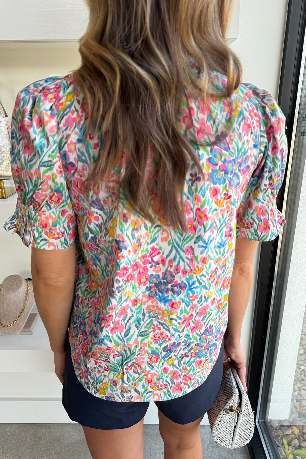 Roze bloemenprint blouse met splithals en pofmouwen