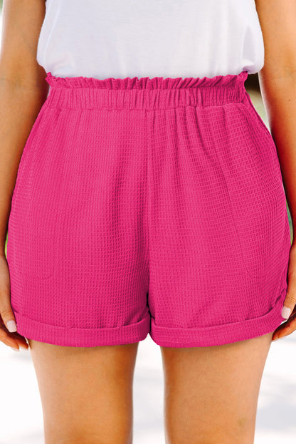 Felroze grote maat short met gerolde rand en gegolfde elastische taille