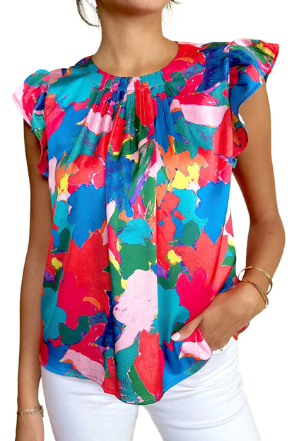 Donkerblauwe blouse met geplooide hals en fladdermouwen met abstracte print