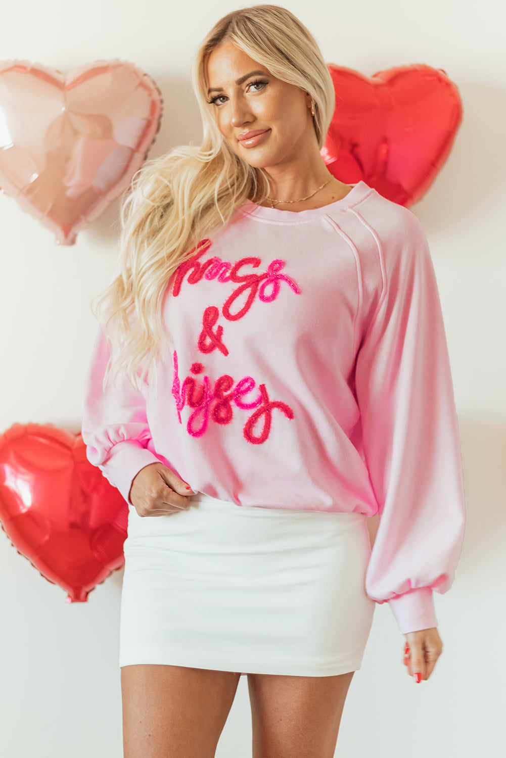 Roze knuffels en kusjes pop -up geborduurd raglan mouw sweatshirt