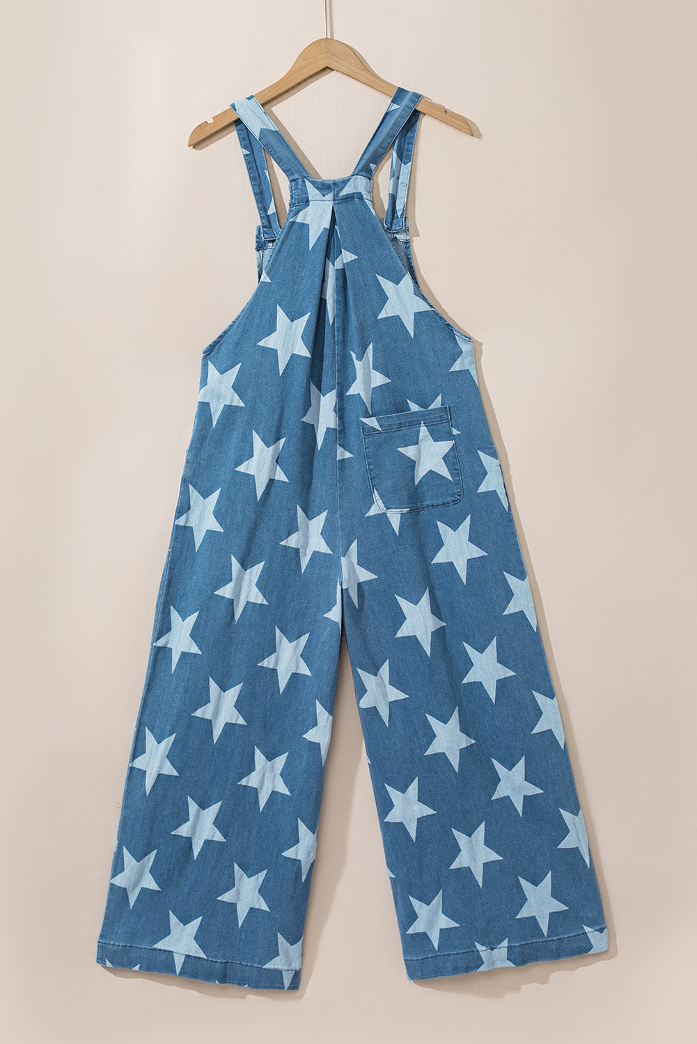 Denim overall met sterrenprint en bandplooi met wijde pijpen en knoopsluiting