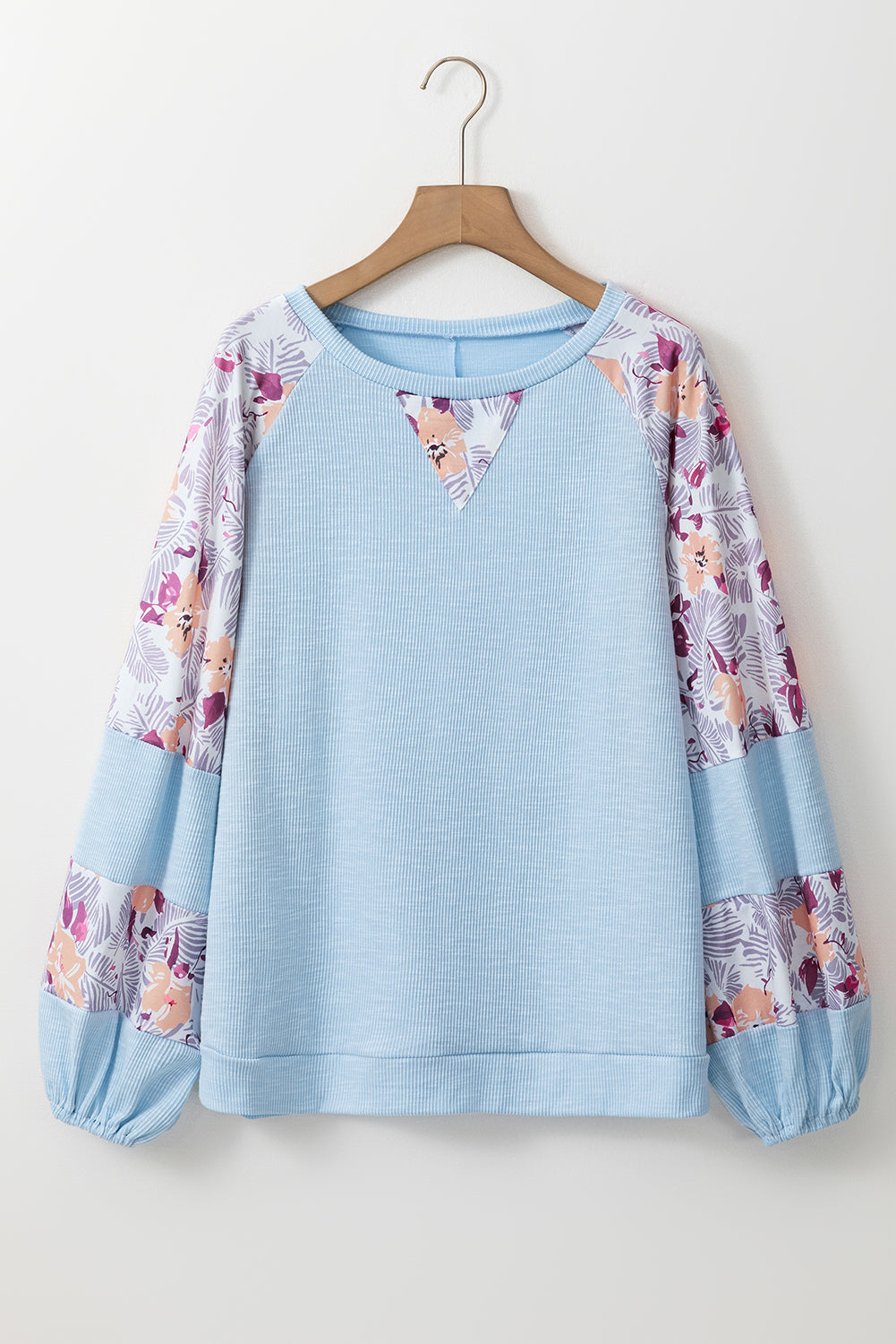 Beau blauwe getextureerde bloemen patchwork blouse met ballonmouwen