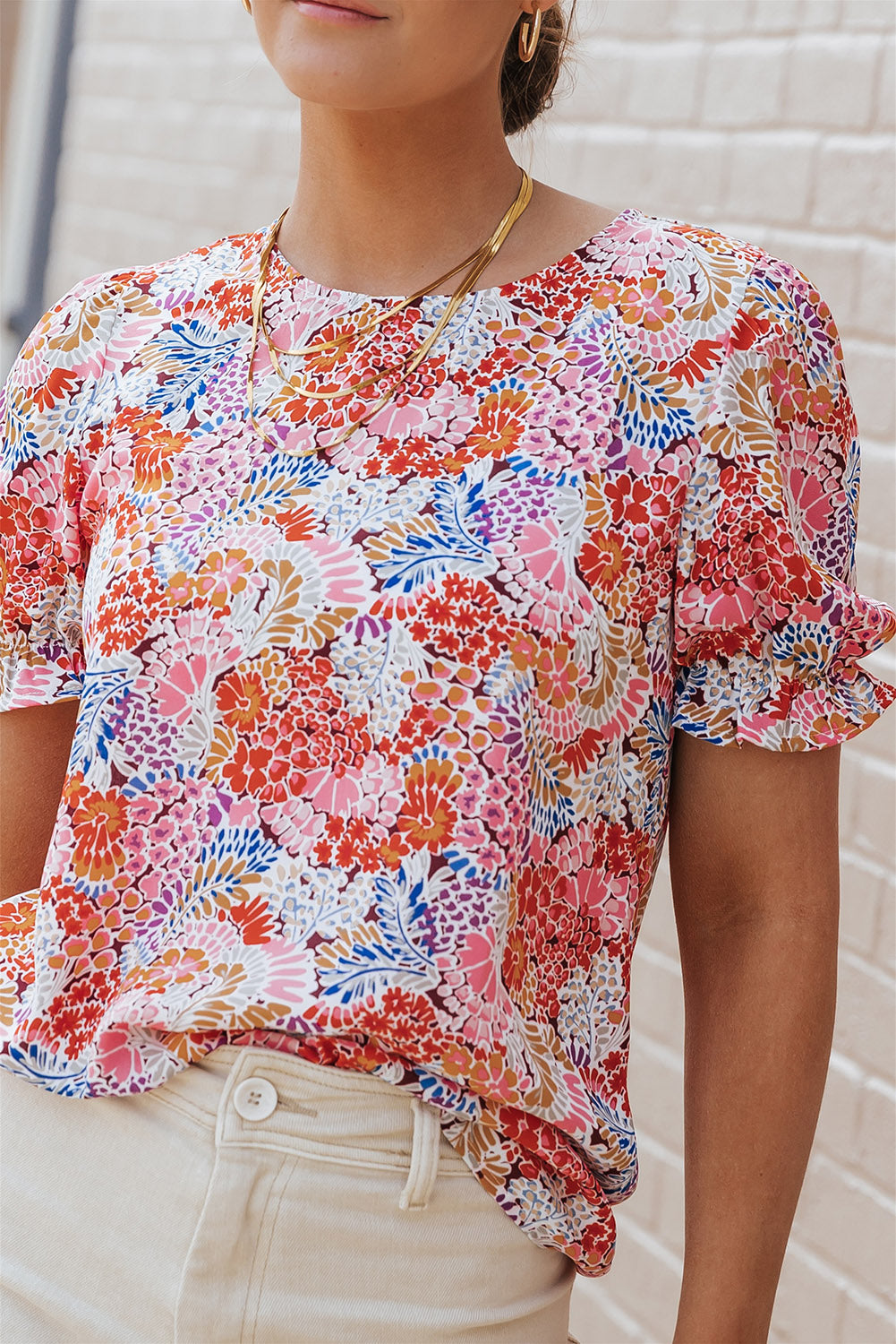 Blouse met veelkleurige bloemenmix en bubbelmouwen