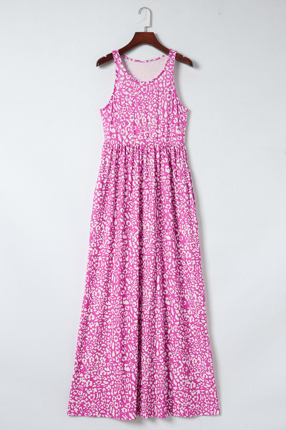 Mouwloze maxi-jurk met roze luipaardprint en zakken