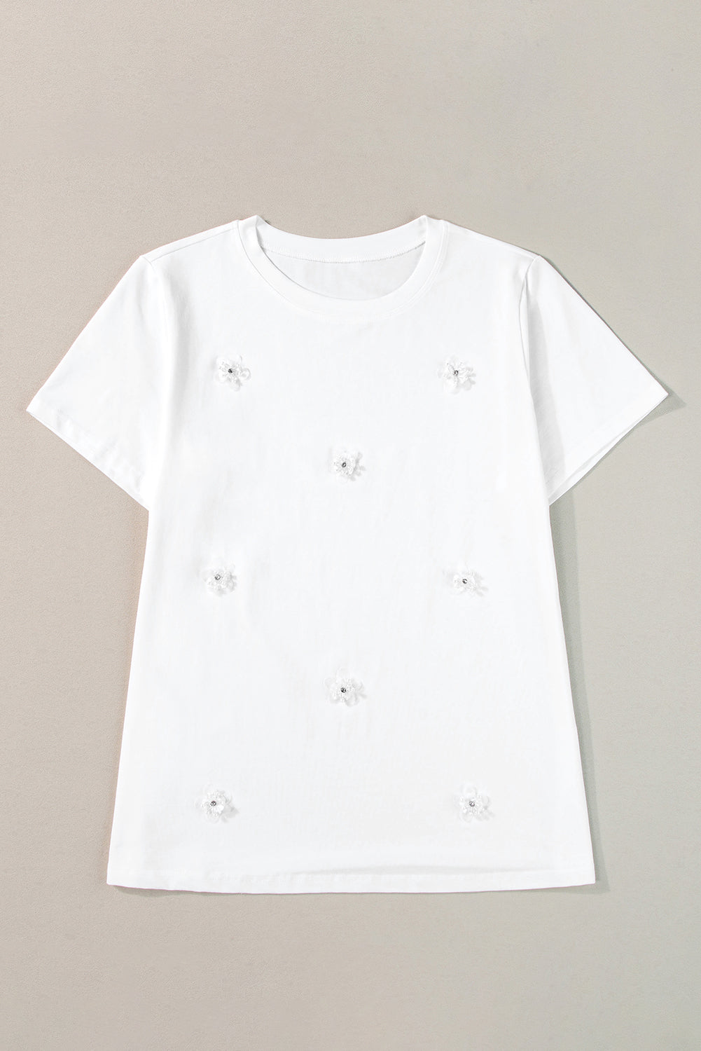 T-shirt met ronde hals en witte bloemenapplicatie