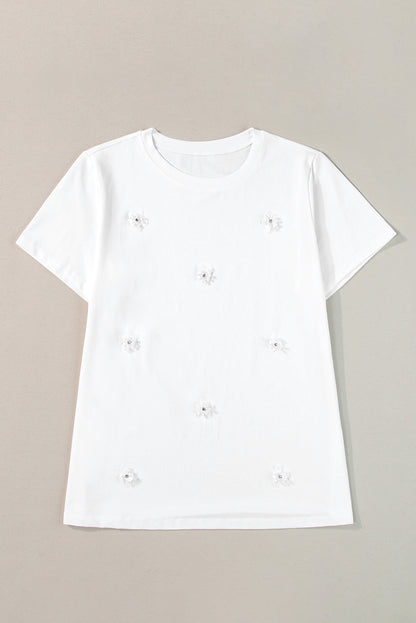 T-shirt met ronde hals en witte bloemenapplicatie