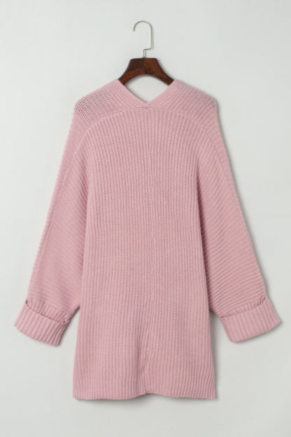 Roze oversized truivest met omslagmouwen