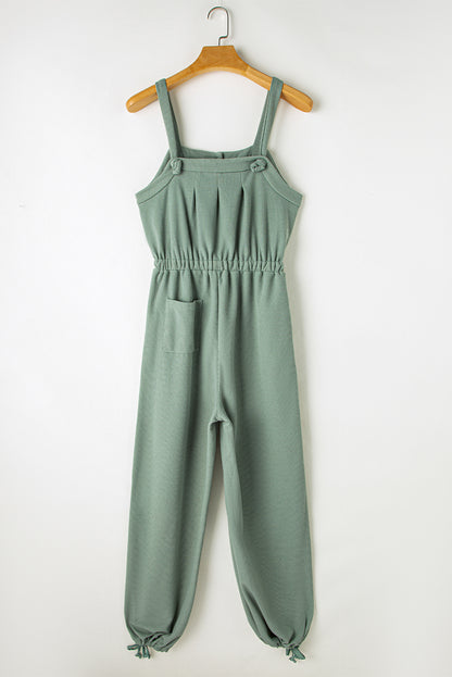 Mosgroene jumpsuit met geknoopte bandjes en knooptextuur met trekkoord