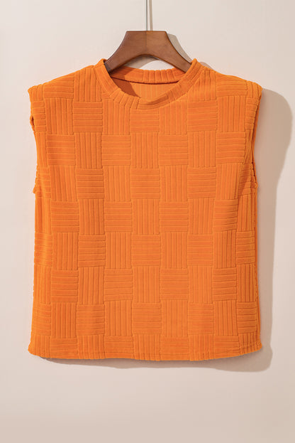 Oranje getextureerde tanktop en broek met wijde pijpen