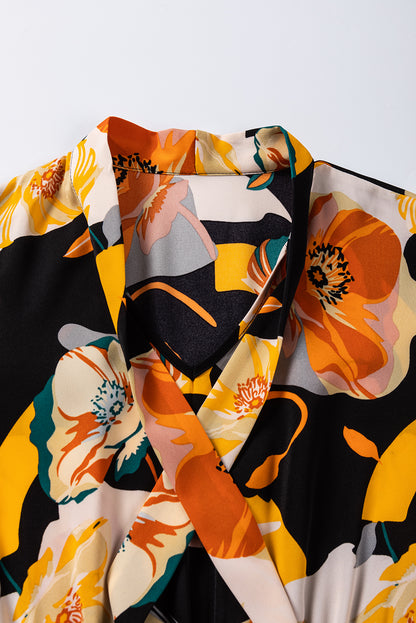 Oranje jurk met bloemenprint en strikhals en lange mouwen