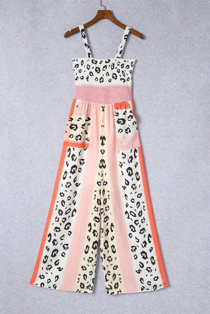 Roze jumpsuit met zakken en print in luipaardkleurenblokken