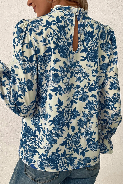 Blouse met bloemenprint, volantmouwen en sleutelgatrug in hemelsblauw