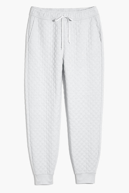 Witte gewatteerde tweedelige set met capuchon en joggingbroek