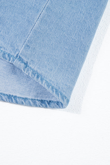 Beau blauwe gegolfde denim top met knopen aan de voorkant