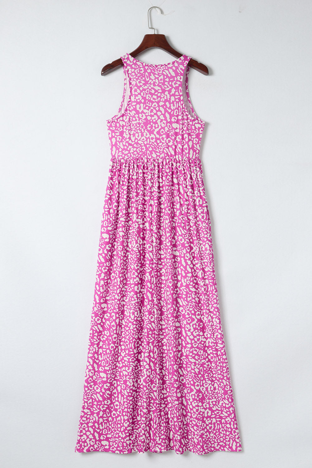 Mouwloze maxi-jurk met roze luipaardprint en zakken