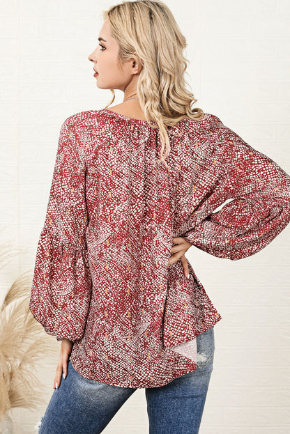 Vurige rode geplooide blouse met abstracte print en lantaarnmouwen