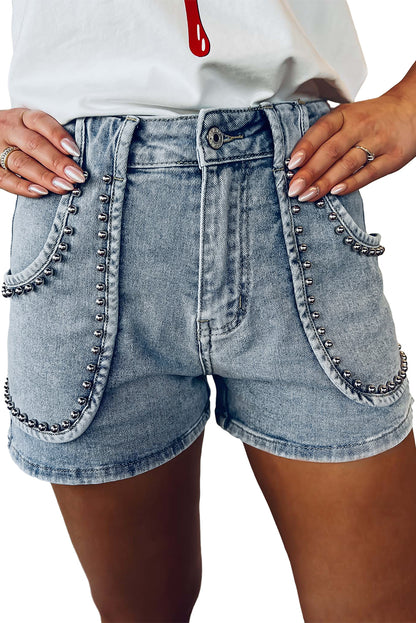 Schemerblauwe jeansshort met studs in zure wassing