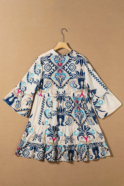 Wit bedrukte mini-jurk met tribal print, armband, mouwen en knopen