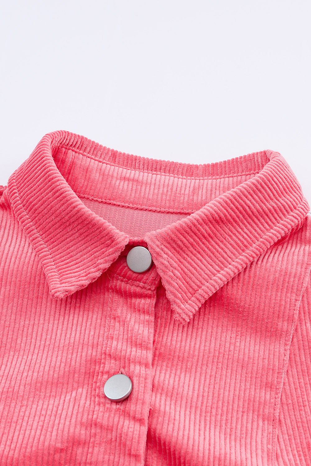 Roze corduroy jack met klepzak en knoopjes