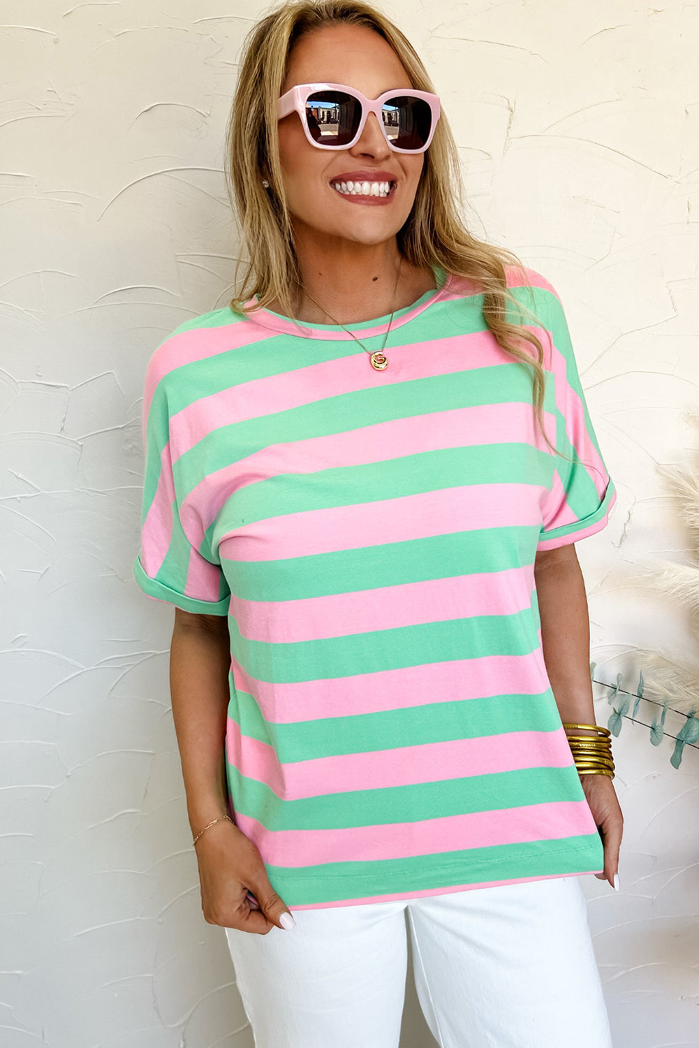 Roze gestreept los T-shirt met colorblock mouwen en manchetten