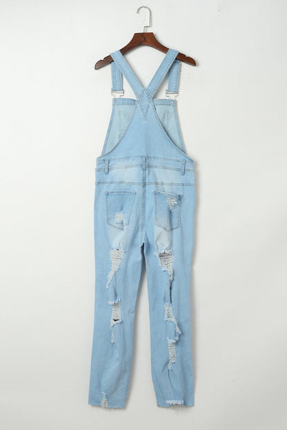 Hemelsblauw geconstrueerde noodlijdende denim overall met borstzak