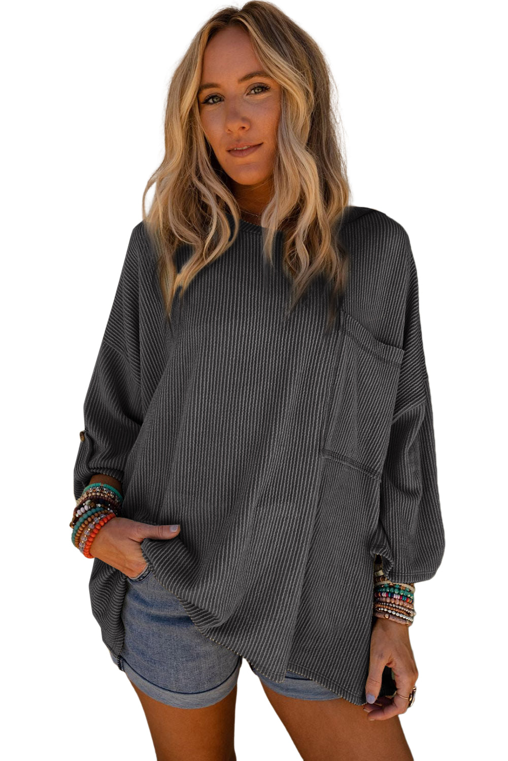 Donkergrijze, geribbelde oversized top met borstzak en rollipjes op de mouwen