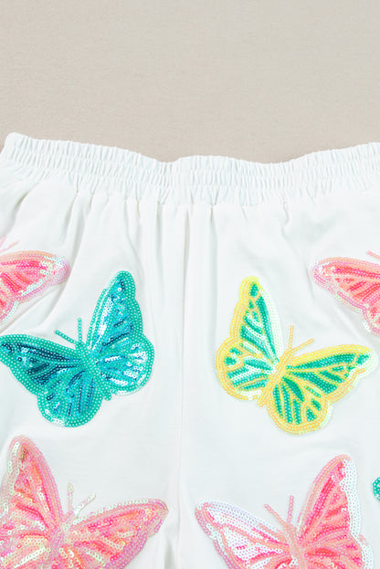 Witte kleurrijke top-shortset met pailletten en vlindermouwen