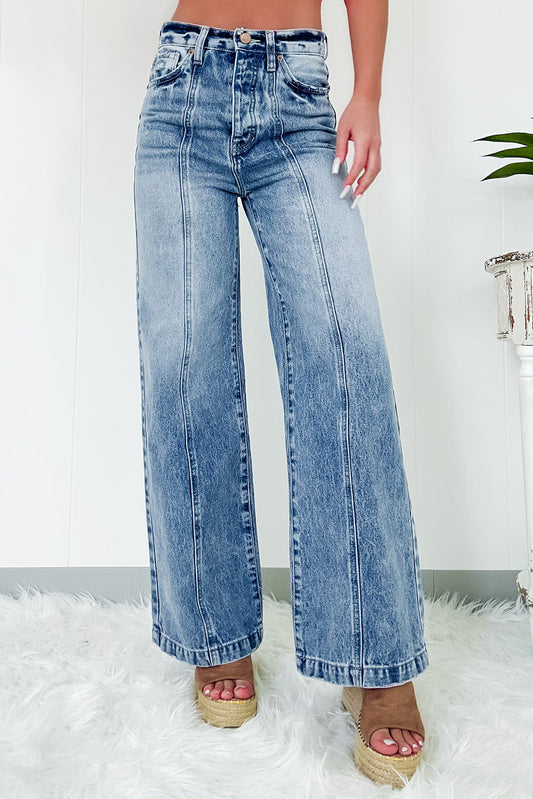 Schemerblauwe jeans met hoge taille en centrale naad met wijde pijpen