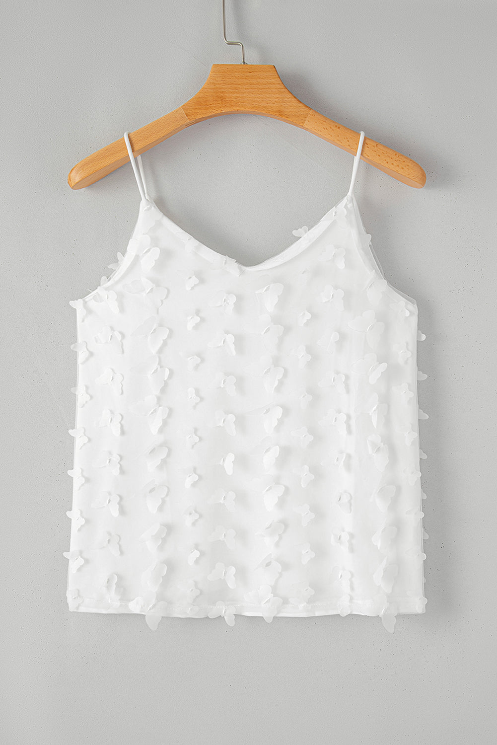 Witte tanktop met mesh-overlay met vlinderappliqué