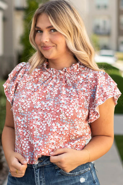 Roze grote maat blouse met bloemenprint, ruches aan de mouwen en ruches aan de hals