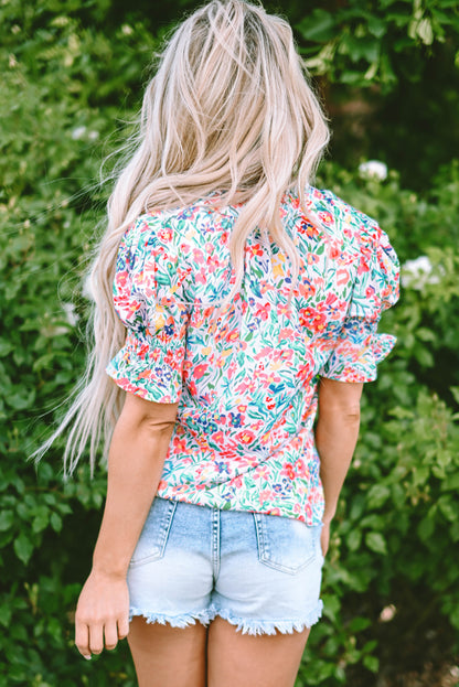 Roze bloemenprint blouse met splithals en pofmouwen