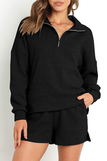 Set van zwart geribbeld sweatshirt met rits en short met hoge taille